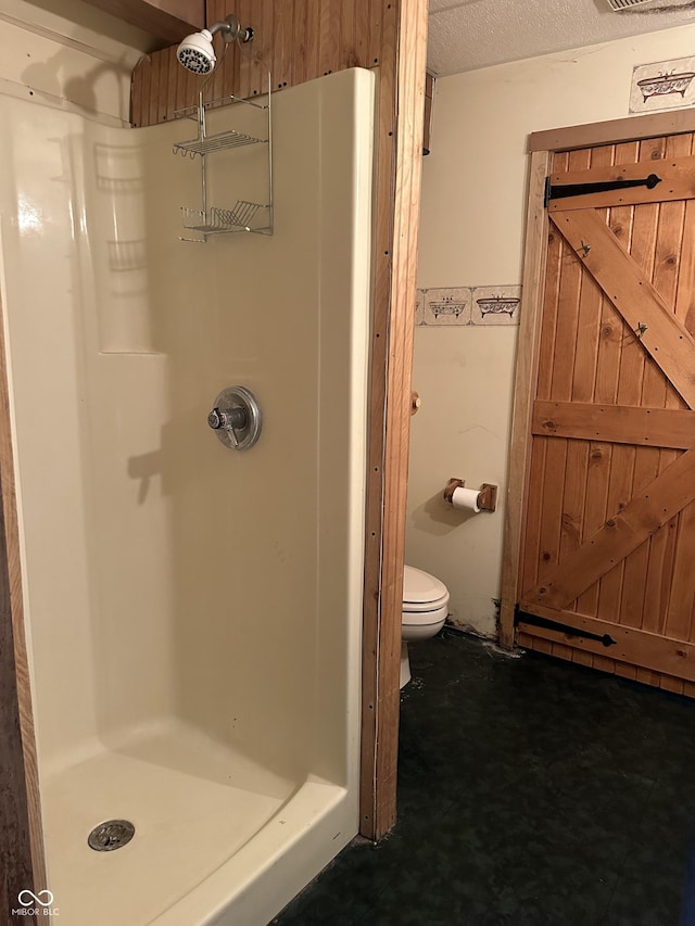 10770 W 650 S, Columbus, IN 47201 - bathroom featuring visible vents, a stall shower, and toilet