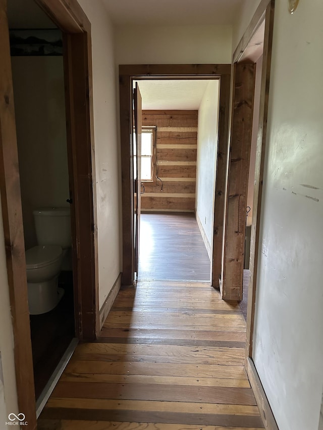 10770 W 650 S, Columbus, IN 47201 - hallway with wood walls and light wood-style flooring