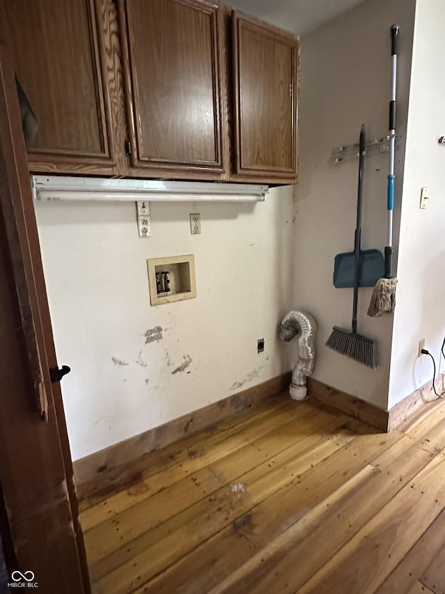 10770 W 650 S, Columbus, IN 47201 - laundry room with washer hookup, baseboards, wood-type flooring, and cabinet space