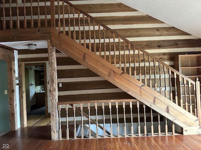 10770 W 650 S, Columbus, IN 47201 - stairway with wood walls and hardwood / wood-style floors