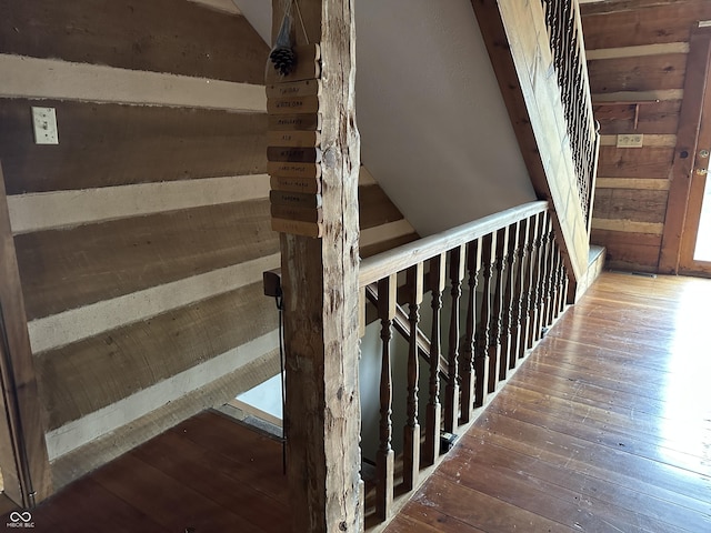 10770 W 650 S, Columbus, IN 47201 - stairway featuring wooden walls and hardwood / wood-style floors