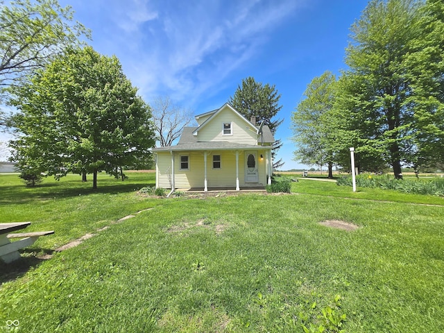 7561 N Hall School Rd, Monrovia, IN 46157 - view of front of house with a front yard and covered porch