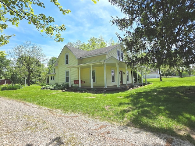 7561 N Hall School Rd, Monrovia, IN 46157 - view of property exterior featuring a porch and roof with shingles
