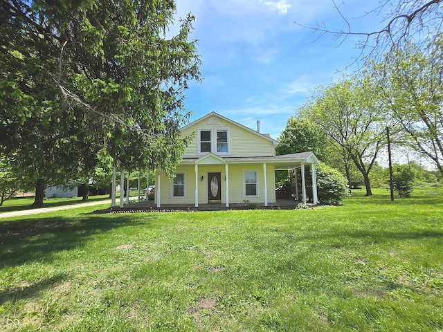 7561 N Hall School Rd, Monrovia, IN 46157 - farmhouse-style home featuring a front lawn and a porch
