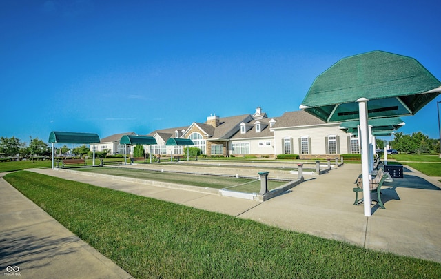 view of property's community with a bocce ball area