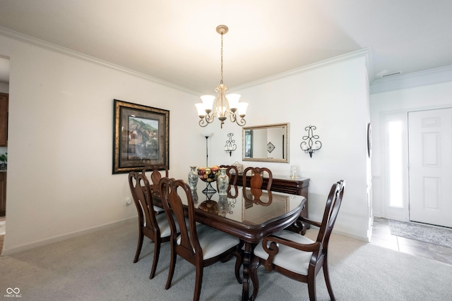 dining area featuring a chandelier, ornamental molding, light colored carpet, and baseboards