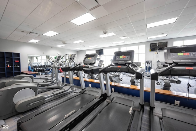 gym featuring a drop ceiling