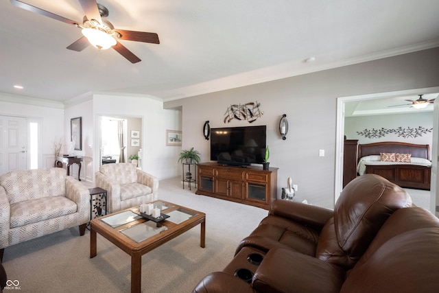 living room featuring ceiling fan, ornamental molding, carpet, and recessed lighting