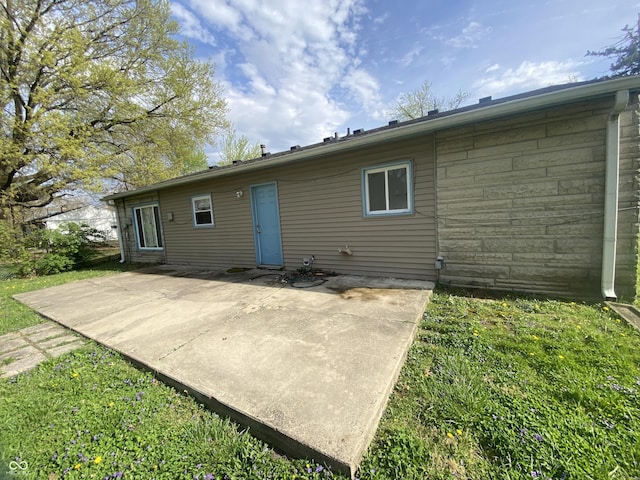 rear view of house with a patio