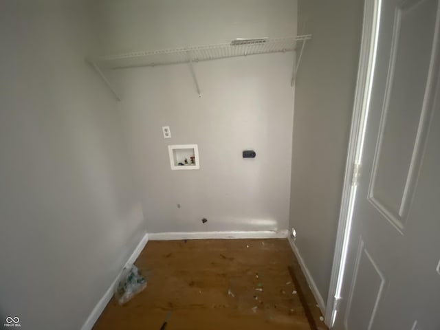 laundry area with washer hookup, laundry area, and baseboards