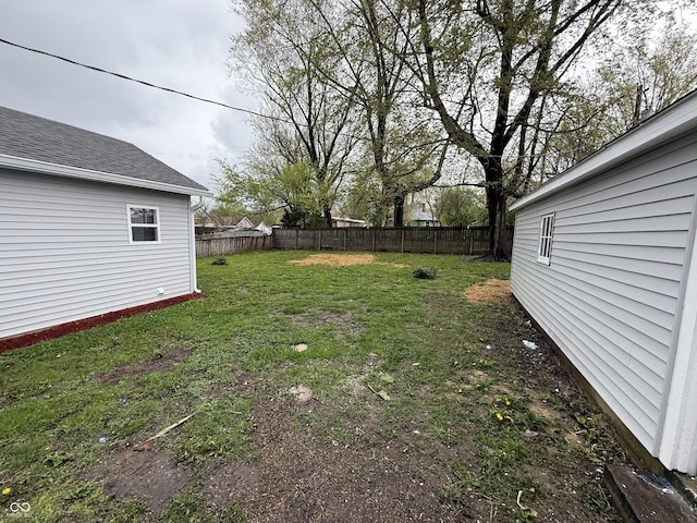 view of yard with a fenced backyard
