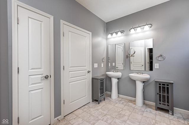5110 Lilium Dr, Plainfield, IN 46168 - bathroom with a sink and baseboards