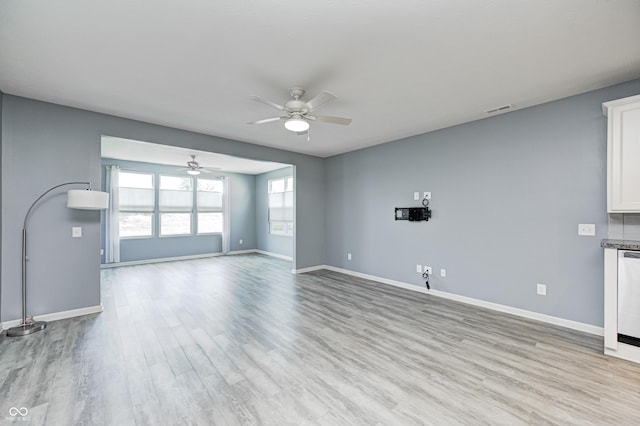 5110 Lilium Dr, Plainfield, IN 46168 - unfurnished living room with a ceiling fan and light wood finished floors