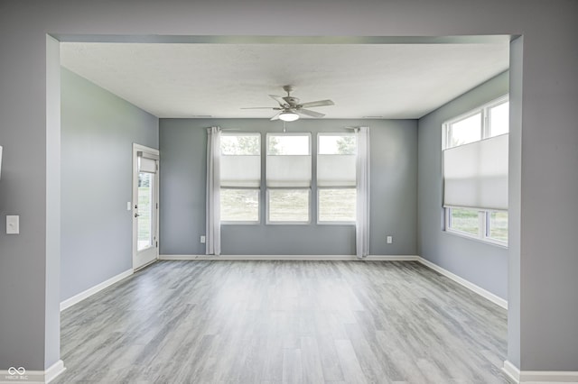5110 Lilium Dr, Plainfield, IN 46168 - unfurnished room with wood finished floors, ceiling fan, and plenty of natural light