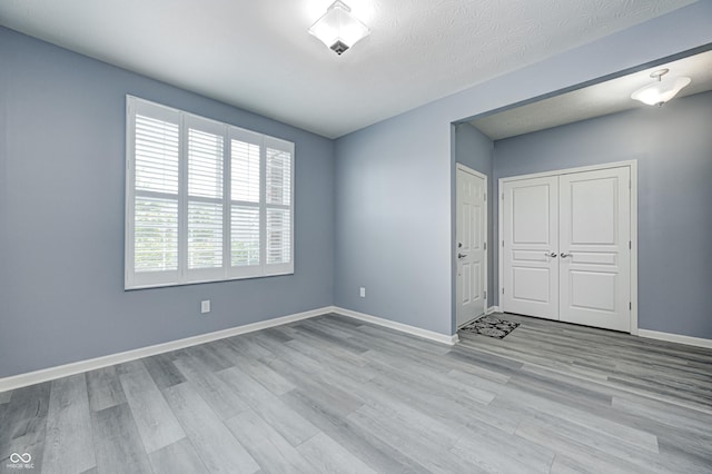 5110 Lilium Dr, Plainfield, IN 46168 - empty room featuring wood finished floors and baseboards