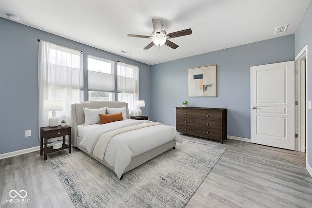 5110 Lilium Dr, Plainfield, IN 46168 - bedroom featuring light wood-style flooring and a ceiling fan
