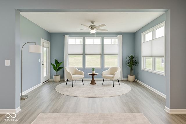 5110 Lilium Dr, Plainfield, IN 46168 - living area featuring wood finished floors and ceiling fan