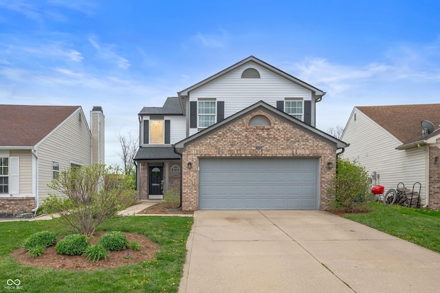 traditional home with a garage, concrete driveway, a front yard, and brick siding