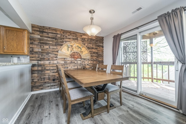8140 Shorewalk Dr Unit C, Indianapolis, IN 46236 - dining area with a healthy amount of sunlight, light wood-type flooring, and visible vents