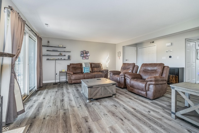 8140 Shorewalk Dr Unit C, Indianapolis, IN 46236 - living room with light wood-style floors and baseboards