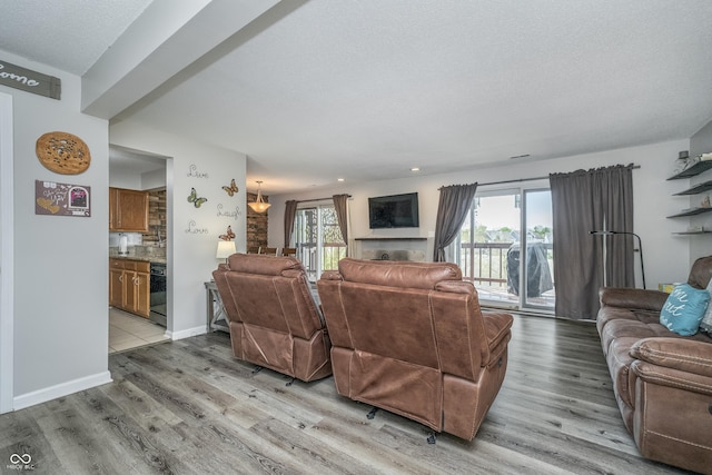 8140 Shorewalk Dr Unit C, Indianapolis, IN 46236 - living area featuring recessed lighting, a textured ceiling, and light wood-type flooring