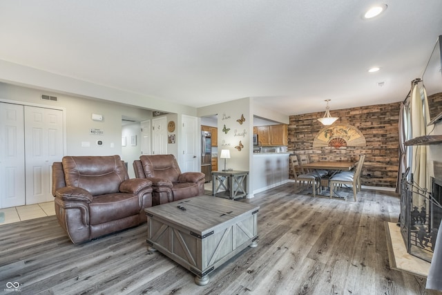 8140 Shorewalk Dr Unit C, Indianapolis, IN 46236 - living area featuring recessed lighting, visible vents, light wood finished floors, and a fireplace