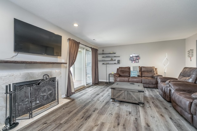 8140 Shorewalk Dr Unit C, Indianapolis, IN 46236 - living area featuring recessed lighting, baseboards, wood finished floors, and a high end fireplace
