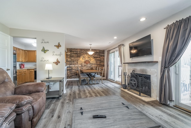 8140 Shorewalk Dr Unit C, Indianapolis, IN 46236 - living area with recessed lighting, a fireplace with raised hearth, and light wood finished floors