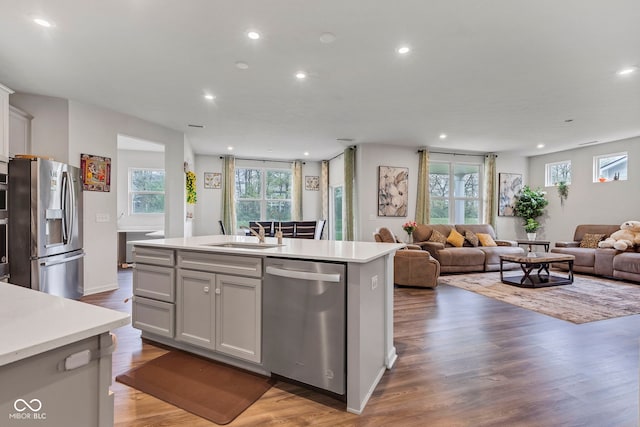 15120 Downham Dr, Fishers, IN 46037 - kitchen with a sink, recessed lighting, open floor plan, and appliances with stainless steel finishes