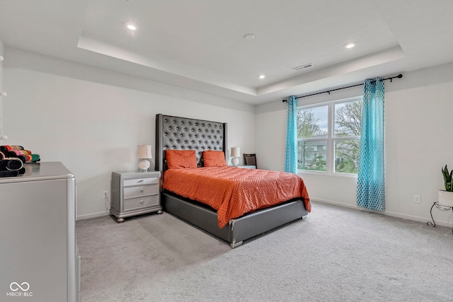 15120 Downham Dr, Fishers, IN 46037 - bedroom featuring light colored carpet, visible vents, baseboards, and a raised ceiling