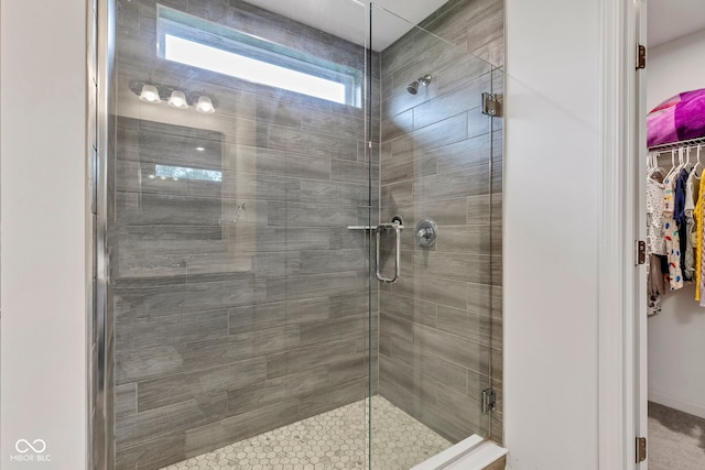 15120 Downham Dr, Fishers, IN 46037 - full bathroom featuring a stall shower and a spacious closet