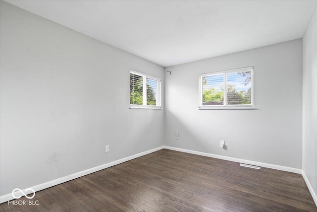 5719 Laurel Hall Dr, Indianapolis, IN 46226 - spare room with baseboards and wood finished floors