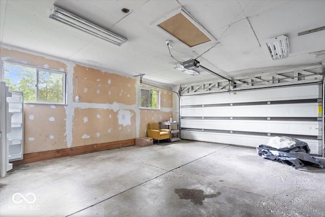 5719 Laurel Hall Dr, Indianapolis, IN 46226 - garage featuring a garage door opener