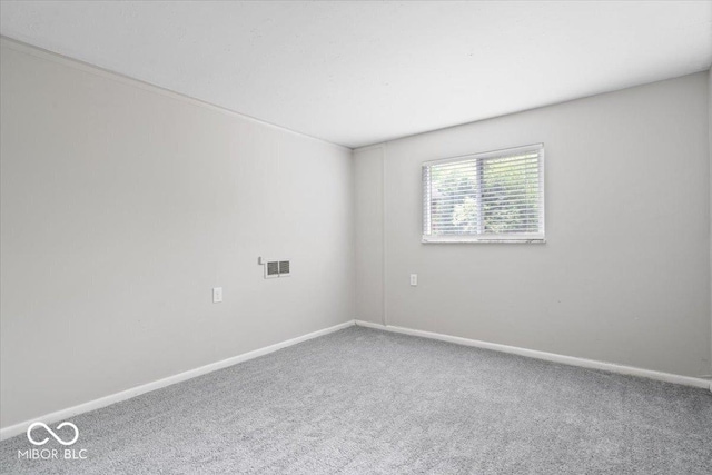 5719 Laurel Hall Dr, Indianapolis, IN 46226 - carpeted empty room with baseboards