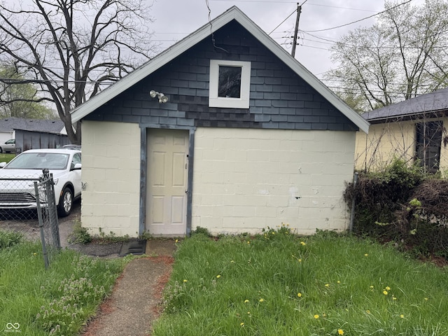 garage featuring fence