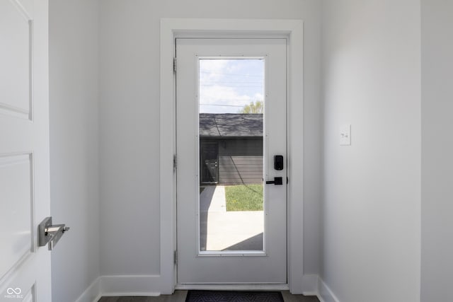 2226 Central Ave, Indianapolis, IN 46205 - doorway featuring plenty of natural light and baseboards