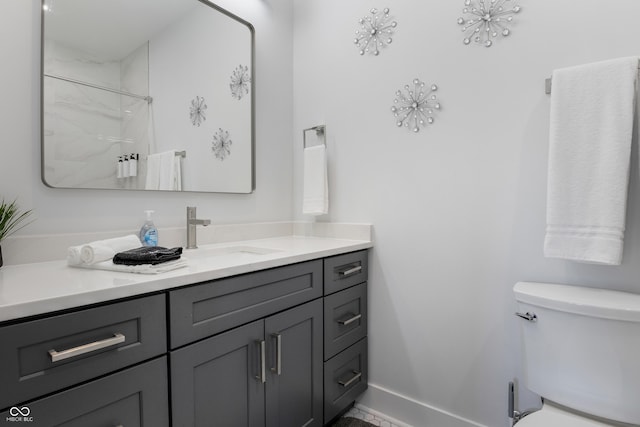 2226 Central Ave, Indianapolis, IN 46205 - bathroom featuring toilet, vanity, a shower with shower curtain, and baseboards