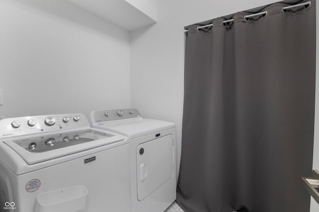 2226 Central Ave, Indianapolis, IN 46205 - clothes washing area featuring washer and clothes dryer and laundry area