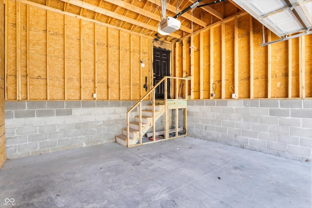 2226 Central Ave, Indianapolis, IN 46205 - garage with a garage door opener and concrete block wall