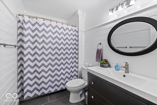 bathroom featuring crown molding, tile patterned flooring, toilet, and vanity