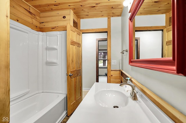bathroom with shower / tub combination, wooden ceiling, and vanity