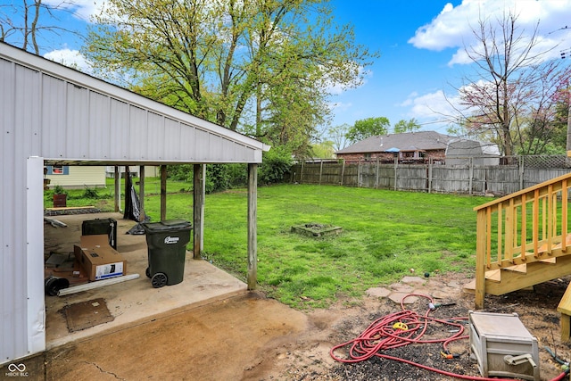 view of yard with a fenced backyard