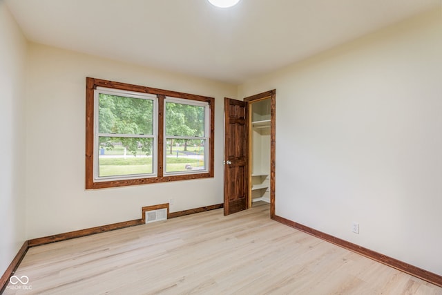 840 N Indiana St, Mooresville, IN 46158 - unfurnished bedroom featuring light wood-style flooring and baseboards