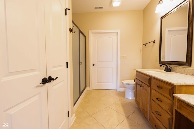 full bathroom featuring vanity, toilet, tile patterned floors, a shower stall, and visible vents