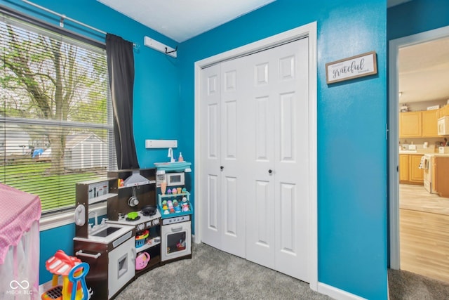 rec room with carpet flooring