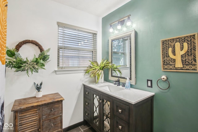 bathroom featuring tile patterned floors and vanity