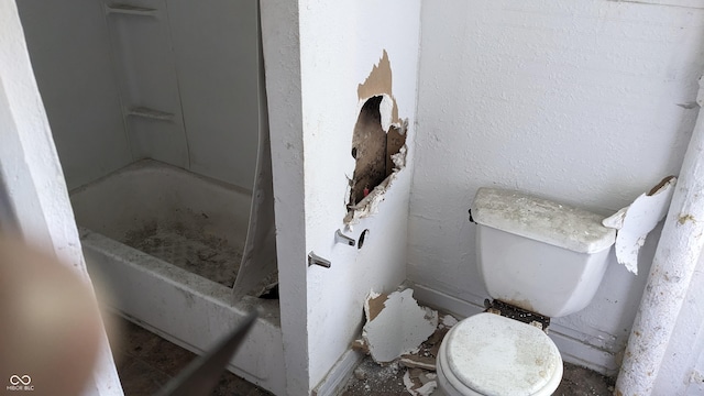 bathroom with a shower, a tub to relax in, and toilet
