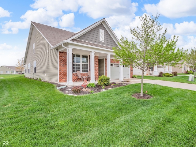 view of front of house featuring concrete driveway, covered porch, brick siding, a front lawn, and a garage