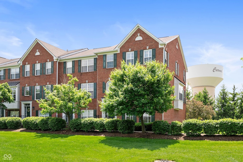 3546 Golden Gate Dr N, Carmel, IN 46074 - view of front of property featuring brick siding and a front yard