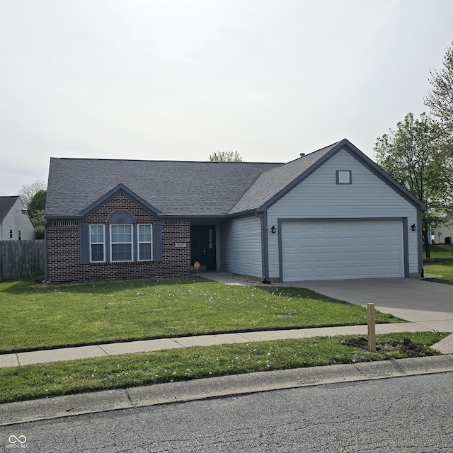 ranch-style house with a front lawn, driveway, a garage, and brick siding